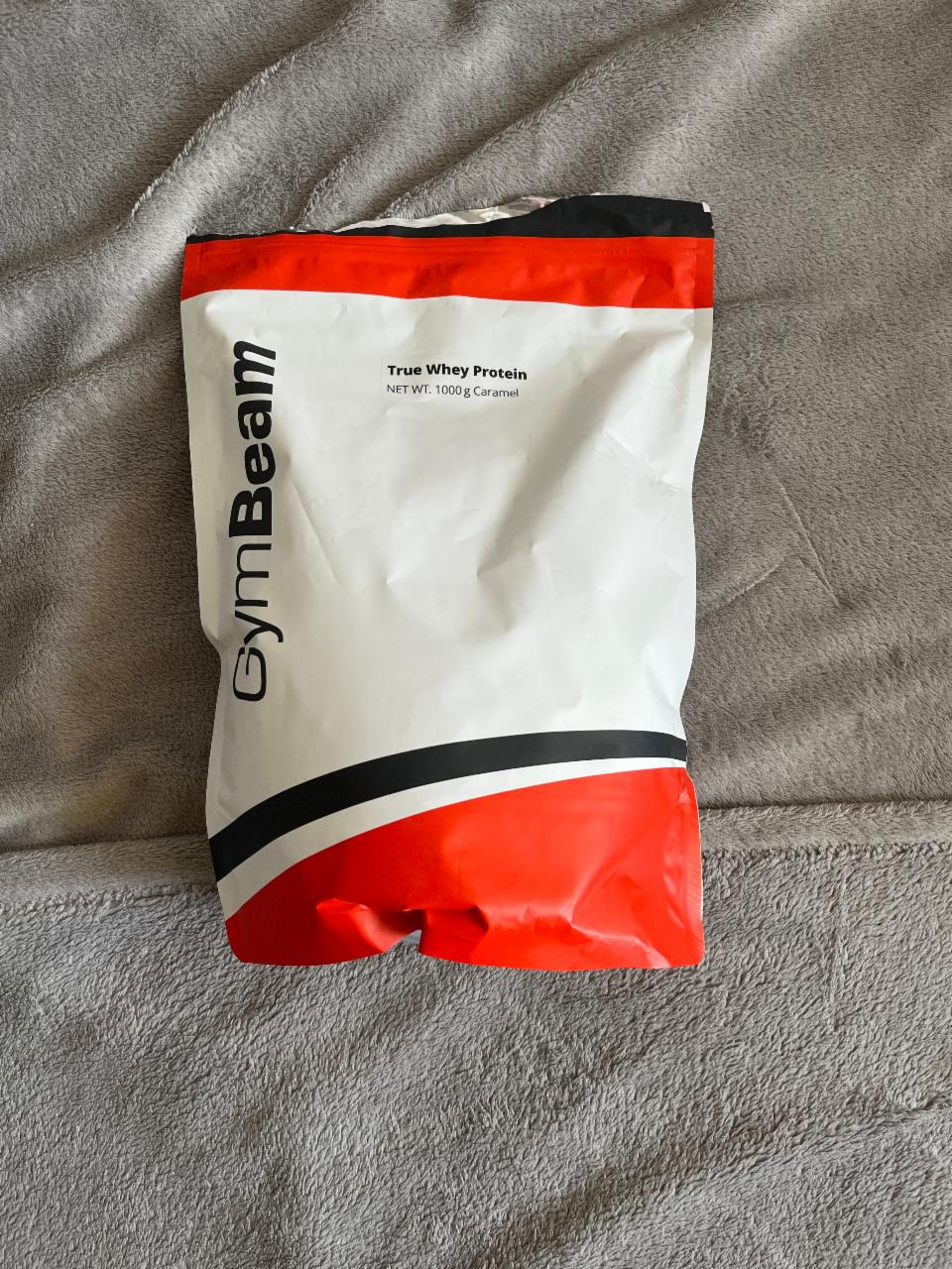 Képek - GymBeam true whey caramel flavour