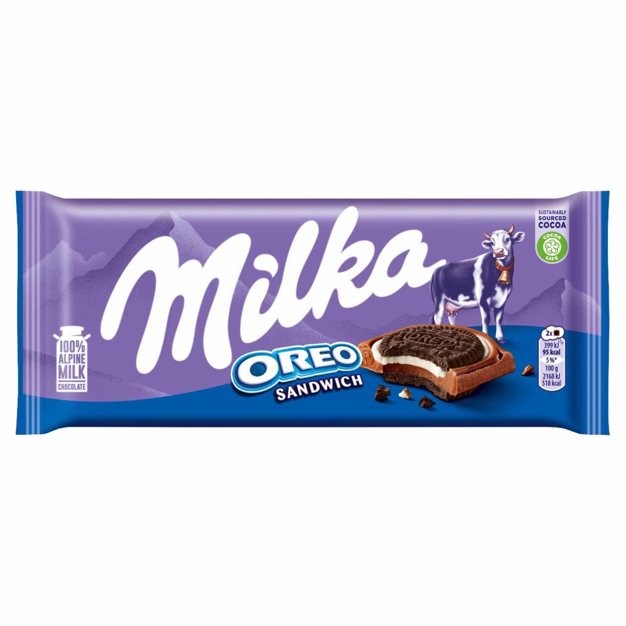 Képek - Milka Oreo Sandwich kakaós kekszek vaníliaízű, tejes krémtöltelékkel alpesi tejcsokoládén 92 g