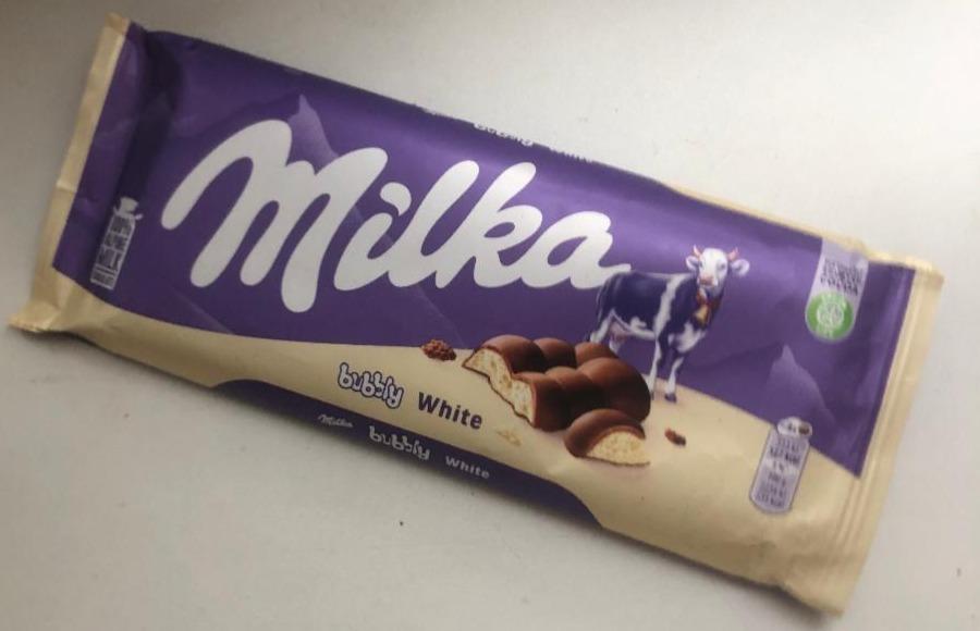 Képek - Milka Bubbly White alpesi tejcsokoládé levegőbuborékos fehércsokoládé töltelékkel 95 g